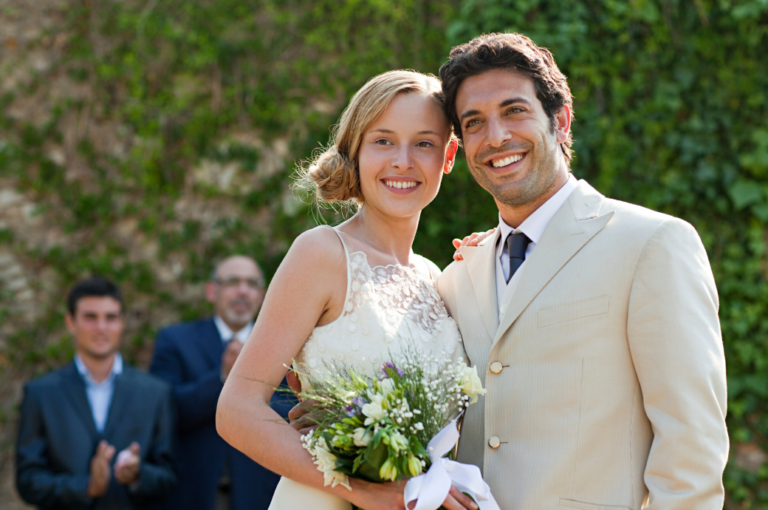 newlyweds-at-marriage-ceremony-looking-away-2024-05-29-03-35-55-utc