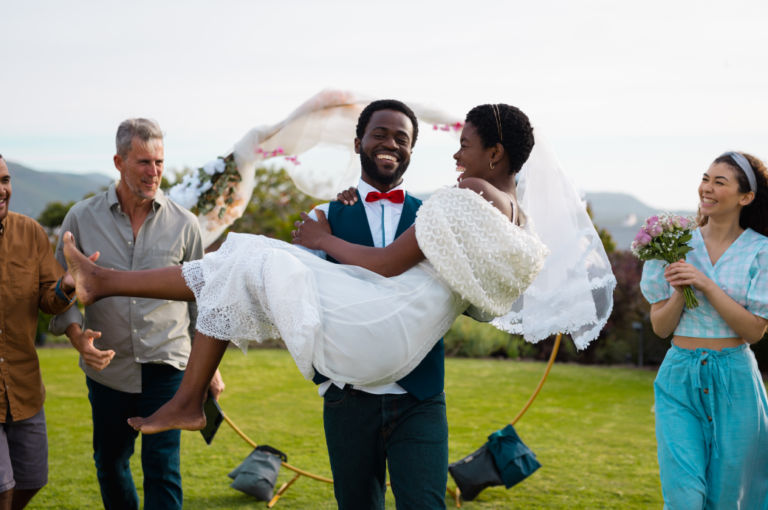 portrait-of-happy-african-american-couple-carrying-2023-12-15-13-15-30-utc